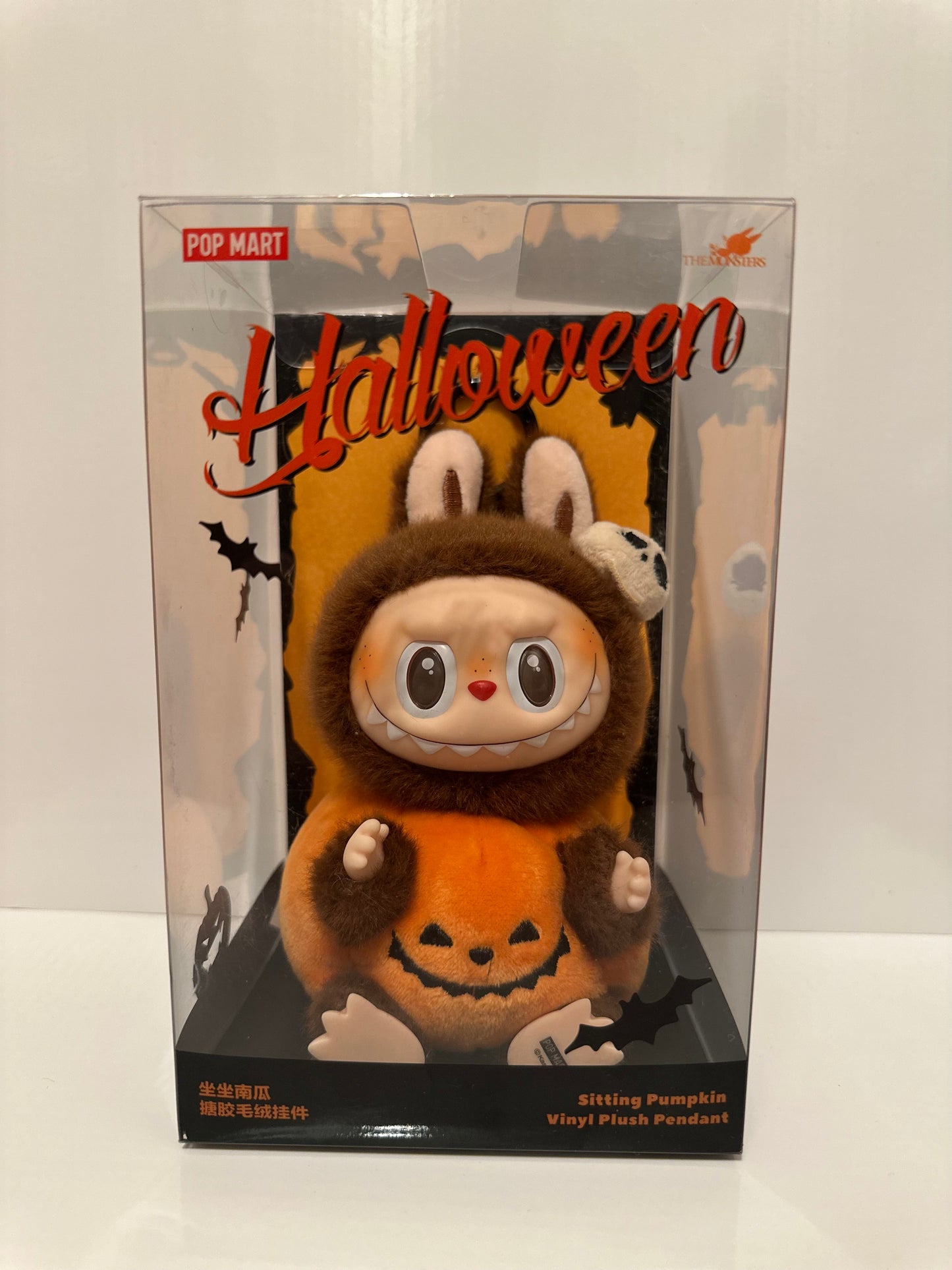 (USA) AUTHENTIC Labubu The Monsters – NEW Pop Mart Exclusive Halloween Labubu – Sitting Pumpkin Vinyl Plush Pendant (Limited Edition)